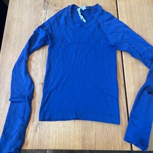 Lululemon Athletica Royal Blue Performance Top waist lenth 2.0 swiftly tech